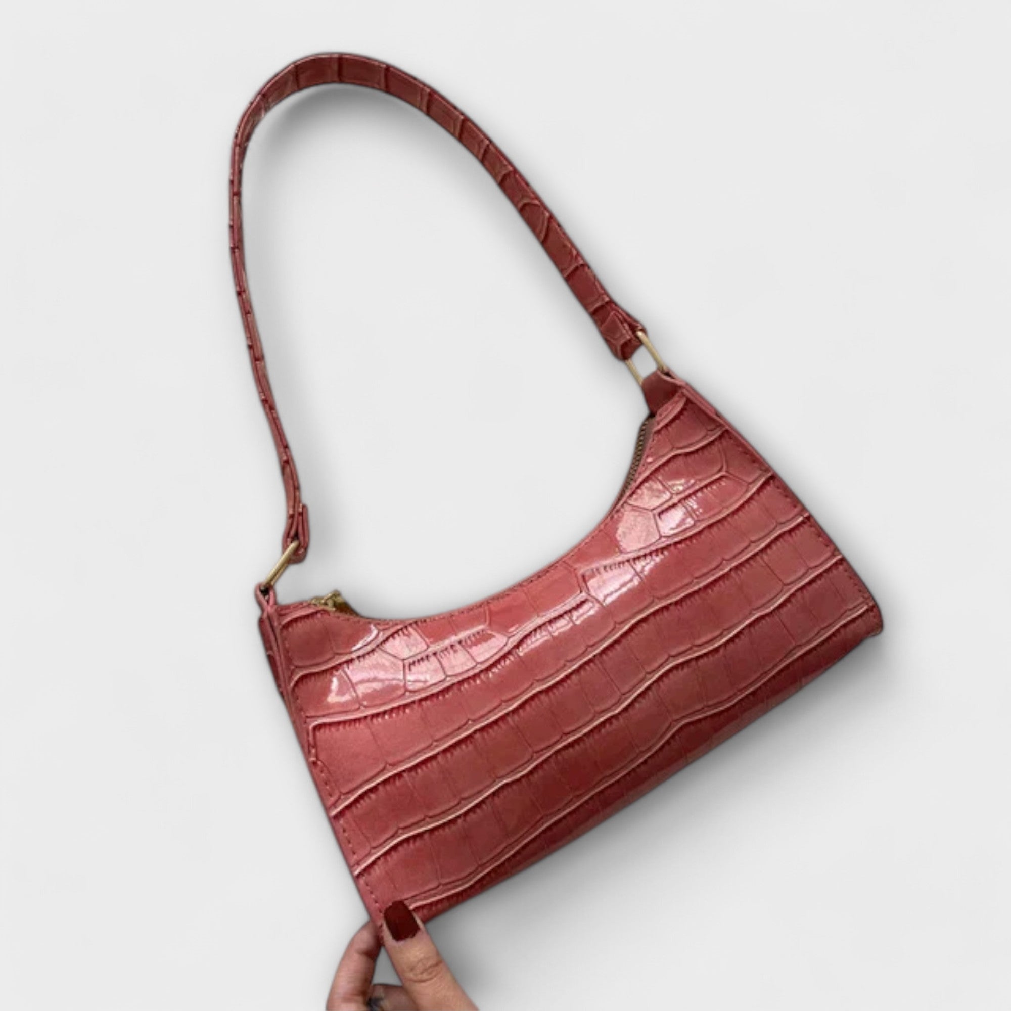 Aurora. - Glänzende Ledertasche